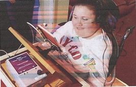 A smile operates this e-reader