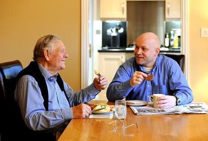 Home Instead caregiver with their client