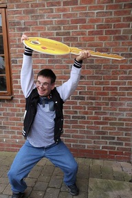 2) Picture of James Wilkinson with a giant key outside new home (C) Golden Lane 