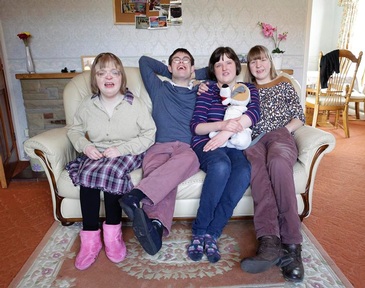 Claire Donaldson, James Wilkinson, Lizzie Searle and Sarah Gibson, who have just moved into a brand new house in Easingwold, North Yorkshrie, thanks to investors in the bond.  (C) Golden Lane Housing (Credit: Layton Thompson) 