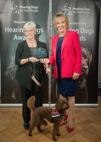 Anne and Tegan accepting their award from Esther Rantzen
