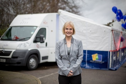 Virtual Dementia Tour inventor P.K. Beville outside dementia van