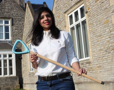 Neha Shahid Chaudhry with the first prototype of the walking stick