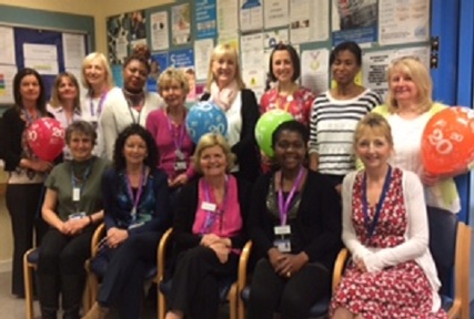 Gill Vincent-Clayden with the Health Visiting for Older People team celebrating 20 years' of the service