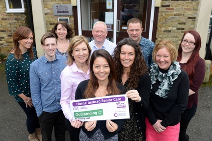 Paul and Jill Tame with members of their officially Outstanding care team