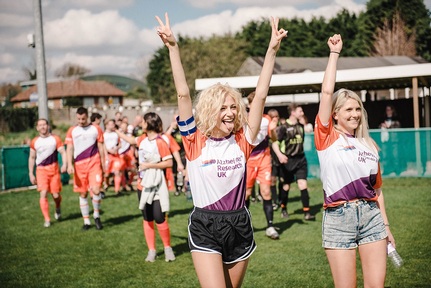 Singer Pixie Lott gets ready to join fight against dementia by leading players for the pitch  Credit: ARUK