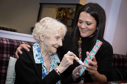 Home Instead Senior Care's  Suray Alvi with 90-year-old Helen Credit:Home Instead Senior Care