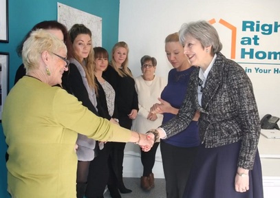 Theresa May meets with home care workers Credit: Right at Home