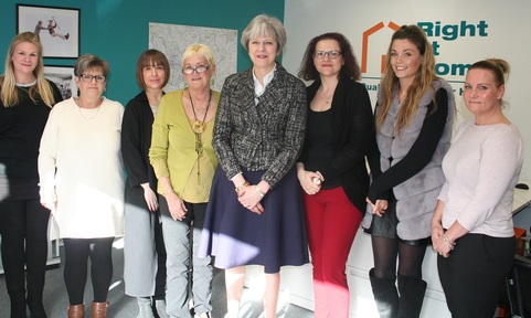 Home care staff with Theresa May Credit: Right at Home
