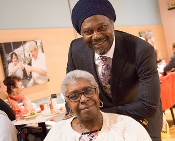 Levi Roots with Mission Care Love Walk resident, Agatha