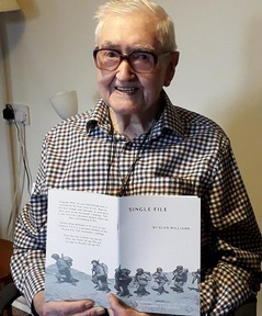 William Glen with his book 'Single File' (written under pseudonym 'Glen Williams'. Credit: Bield Housing and Care.