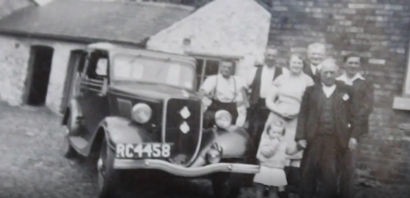 Thelma Bradshaw with her family and their Ford Popular. Credit: Thelma Bradshaw.