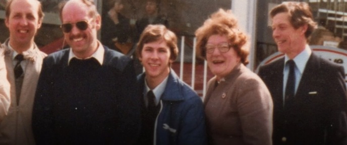Thelma Bradshaw after passing her advanced driving test for the first time in 1977, with instructor and examiner.