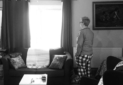 Kat Thomas in the flat where she spent seven days in social isolation