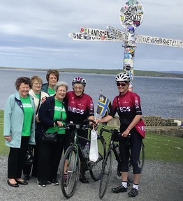 Cycling duo Mavis Paterson and Heather Curley at the finish line. Credit: Facebook @maviscycle.
