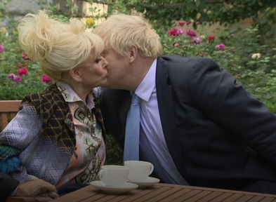 Barbara Windsor seals 10 Downing Street  talks with a kiss. Credit: BBC
