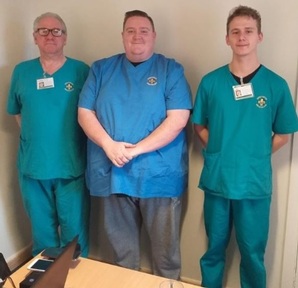 L-R: Robert Morgan with fellow home care workers Tim Johnson and Ryan Edwards. Credit: Powys County Council