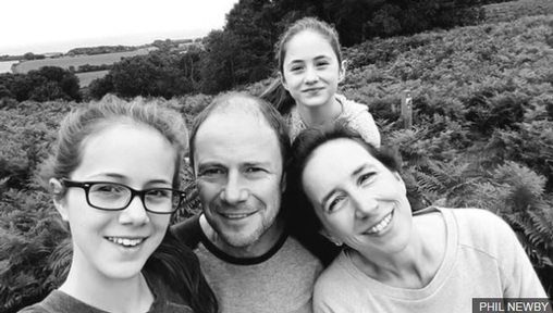 Phil Newby with his partner and two children. Credit: Phil Newby.