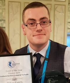 Dave Finch holding his Bluebird Care finalist award certificate. Credit: Bluebird Care York