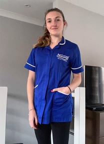 Abi Byrne in her Caremark uniform. Credit: Abi Byrne.