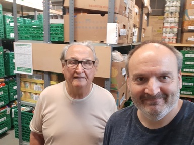 Bluebird Care staff volunteering in food bank warehouse. Credit: Bluebird Care.