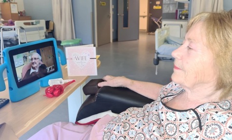 Isabel Devine  at New Victoria Hospital is seen with her Valentine's card from husband Ian Devine who is receiving treatment at QEUH. Credit: New Victoria Hospital