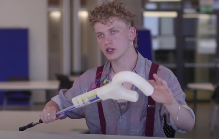 Industrial design student James Bayliss with his invention. Credit: Loughborough University