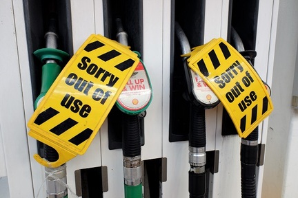 No fuel signs on petrol pumps at shut station in Chorleywood, Hertfordshire. Credit:  Peter_Fleming/ Shutterstock