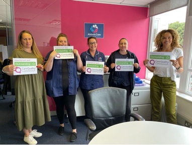 Some of the team from Abbots Care with Camille Leavold (right). Credit: Abbots Care.