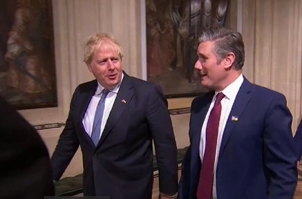 Prime Minister Boris Johnson chats to Labour leader Keir Starmer on the way to hear Queen's Speech. Credit: Parliament TV