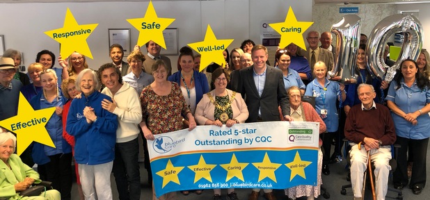 Bluebird Care celebrating their 'outstanding' CQC report and 10th birthday. Credit: Bluebird Care.