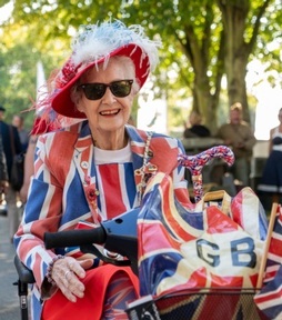 Disabled woman dressed in union jack colours. Credit: Sarnia / Shutterstock