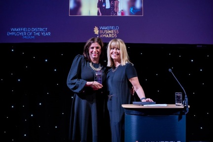 Narinder Gill accepting the award. Credit: Bluebird Care.