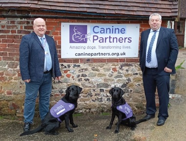 David Watson from Canine Partners and David Glover from Caremark. Credit: Caremark.